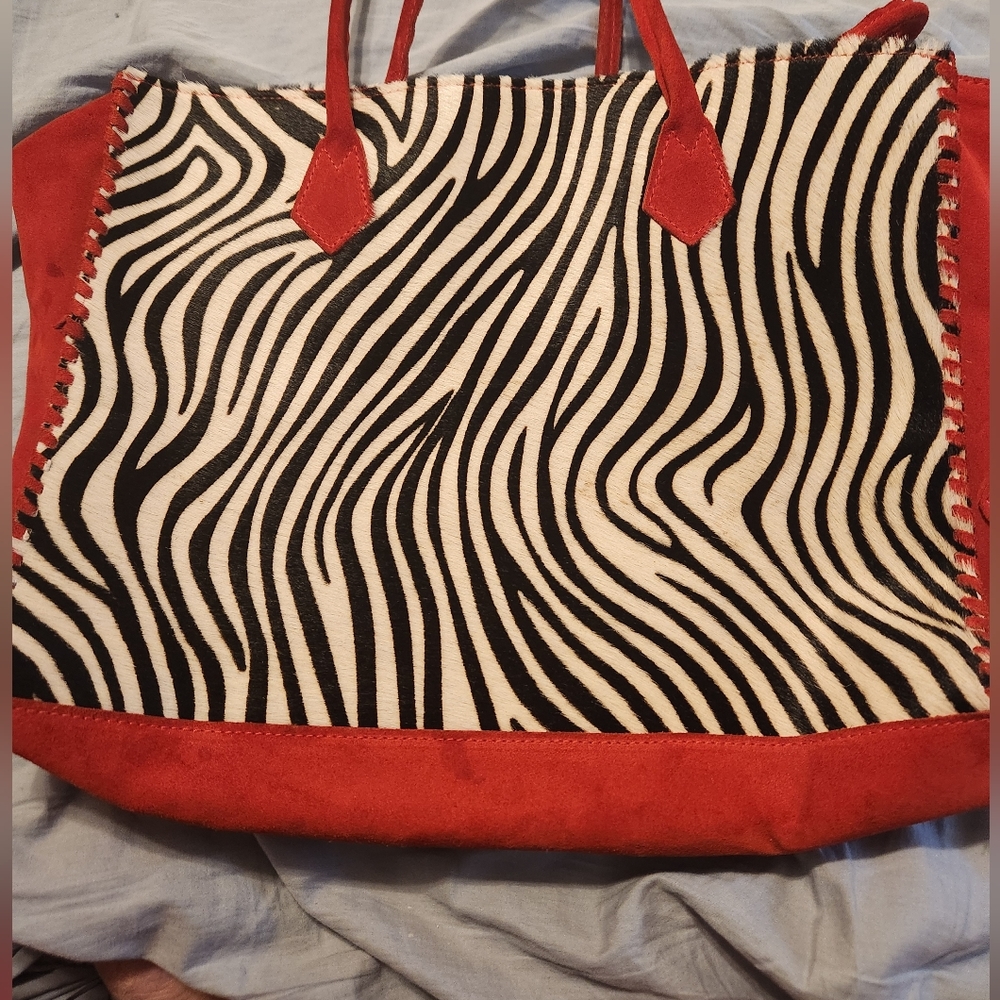 Zebra faux fur and red suede handbag